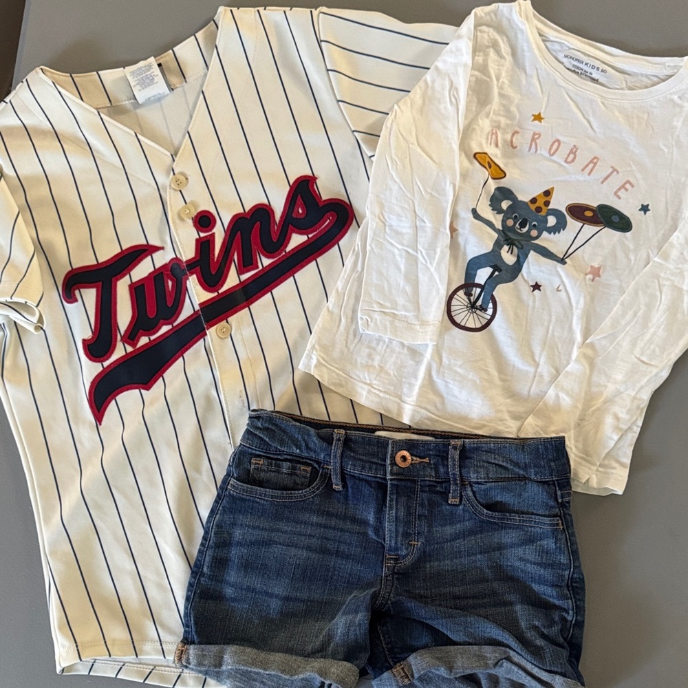 Lot of kids shirts and shorts